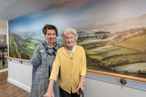 Theresa McNally with a Vida Grange resident