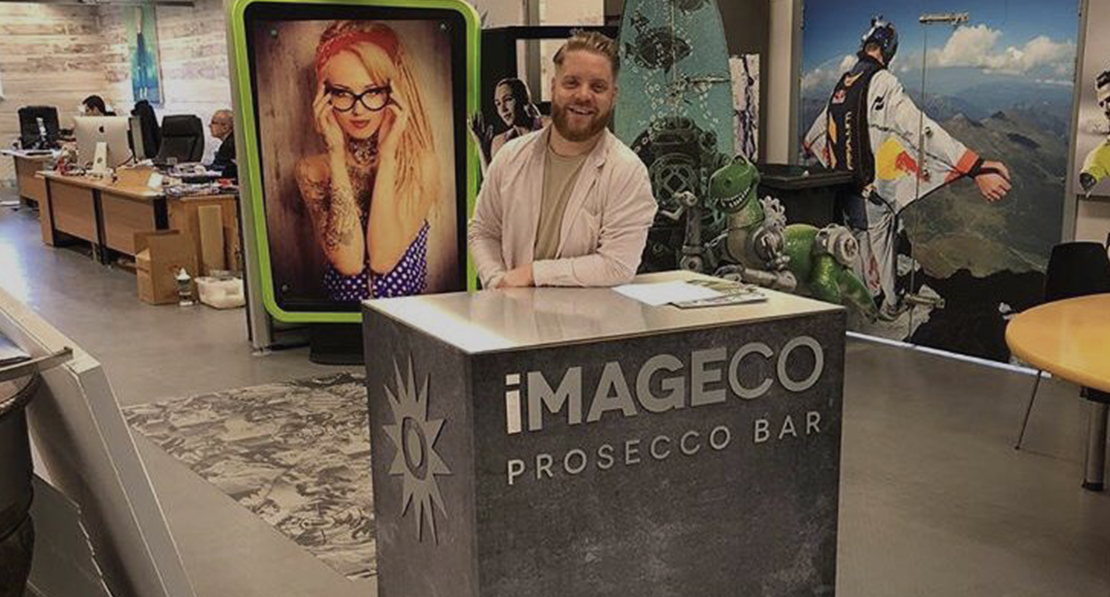 Team member Tommy in the Imageco office